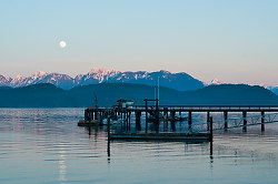 Rising Moon Over Squirrel Cove Dock - Cortes Island Harbour photo